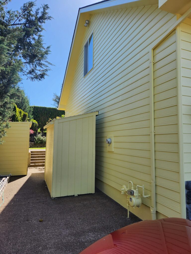 The sheds were included in the bid for this house repaint project by paintdrspainting.com